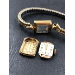 A VINTAGE TISSOT LADIES WRIST WATCH WITH A 9ct HALLMARKED GOLD HEAD IN A GOLD PLATED EXPANDING