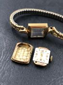 A VINTAGE TISSOT LADIES WRIST WATCH WITH A 9ct HALLMARKED GOLD HEAD IN A GOLD PLATED EXPANDING