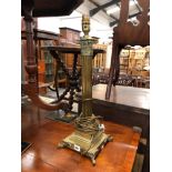 A BRASS CORINTHIAN COLUMN TABLE LAMP