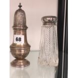 A HALLMARKED SILVER SUGAR SIFTER AND A SILVER TOPPED GLASS EXAMPLE. WEIGHABLE SILVER 144grms.