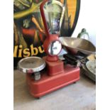 A BERKEL AUTOSCALE LTD RED ENAMEL SCALE FOR WEIGHING UP TO 4LB, THE FAN SHAPED DIAL MARKED UP TO