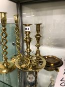 TWO PAIRS OF BRASS CANDLESTICKS, A TRIVET AND OTHER BRASS WARE