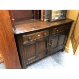 AN OAK SIDEBOARD