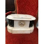 A WHITE MARBLE CASED CLOCK THE PENDULUM MOVEMENT TO COUNTWHEEL STRIKE ON A BELL, THE CASE. W 39cms.
