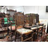 A SET OF FOUR LATE STEWART STYLE STAINED WOOD CHAIRS, TO INCLUDE ONE WITH ARMS, A PAIR OF OAK CHAIRS