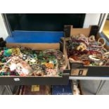 TWO LARGE BOXES OF COSTUME BEADS.