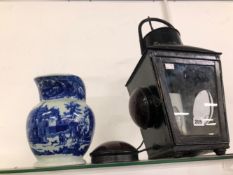 A BLACK METAL RAILWAY LANTERN CONVERTED TO ELECTRICITY TOGETHER WITH A BLUE AND WHITE JUG