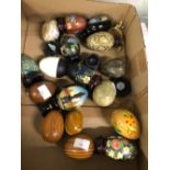 A COLLECTION OF LACQUER, STONE AND CLOISONNE EGGS