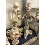 A GERMAN FLOWER ENCRUSTED COVERED VASE, A CANDELABRUM AND A COPELAND PARIAN FIGURE OF MUSIDORA