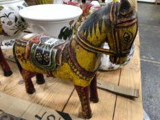 A PAIR OF KASHMIRI PAINTED WOODEN STALLIONS