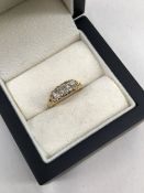 AN ANTIQUE OLD CUT DIAMOND THREE STONE RING, THE INSIDE SHANK ENGRAVED 48th ANNIVERSARY 1807-1855