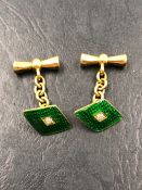 A PAIR OF ANTIQUE GREEN ENAMEL AND OLD CUT DIAMOND CUFFLINKS. EACH CUFFLINK STAMPED 18ct, T.P. GROSS