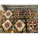 SIX MINTON TILES MOULDED WITH IHS MONOGRAMS AND WITH FLEURS DE LYS