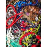 A LARGE QUANTITY OF VARIOUS VINTAGE AND LATER COSTUME AND HARDSTONE BEAD NECKLACES, BRACELETS AND