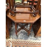 AN ARTS AND CRAFTS MAHOGANY OCTAGONAL TABLE, THE FLUTED LEGS JOINED BY AN X-SHAPED BALUSTRADE