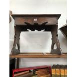 AN 18th C. OAK JOINT STOOL SUPPORTED ON PILASTER ENDS AND WITH CUT WORK APRON
