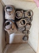 TWO GRADED SETS OF FIVE RING HANDLED IRON WEIGHTS, 14LBS TO 1LB