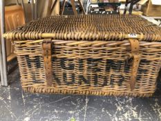 A LINEN BASKET CONTAINING BOOKS ON LOCAL VILLAGES, MEDICINE, WINE, ETC.