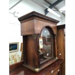 A MAHOGANY LONG CASE CLOCK HOOD.