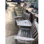 FIVE TEAK OUTDOOR CHAIRS TOGETHER WITH A LOVE SEAT