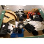 AN OLYMPUS CAMERA WITH SOME LENSES, A MINOX 35GL CAMERA AND A PENTAX ESPIO 738 CAMERA, ETC.