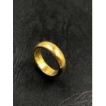 A VINTAGE 22ct HALLMARKED GOLD WEDDING RING. FINGER SIZE K. WEIGHT 10.65grms.