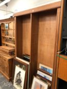 A LARGE OPEN FRONT DOUBLE BOOKCASE