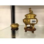 A ORIENTAL GILT BRONZE CENSOR TOGETHER WITH A SIMILAR LIDDED BOX EACH ON HARDWOOD STAND