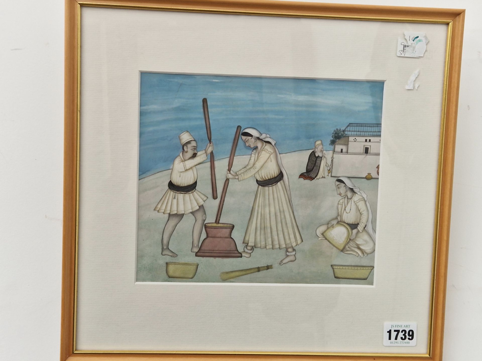 AN INDIAN WATERCOLOUR OF A HUSBAND AND WIFE POUNDING GRAIN WHILE AN ELDERLEY MAN SMOKES A HOOKAH - Image 2 of 2