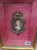 A DECORATIVE MINIATURE PORTRAIT PAINTING OF A LADY IN 18th CENTURY DRESS.