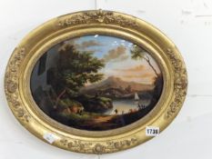 19th CENTURY ITALIAN SCHOOL A REVERSE LANDSCAPE PAINTING ON GLASS MOUNTED IN OVAL GILT FRAME.