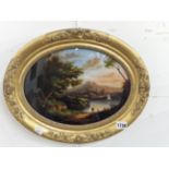 19th CENTURY ITALIAN SCHOOL A REVERSE LANDSCAPE PAINTING ON GLASS MOUNTED IN OVAL GILT FRAME.