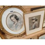 A WATERCOLOUR STUDY OF A FISHERMAN SIGNED R. HERLEYAND A PORTRAIT OF A YOUNG GIRL IN GILT FRAME.