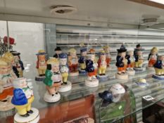 A COLLECTION OF TWENTY TWO STAFFORDSHIRE AND OTHER CASTER FIGURES OF MEN