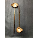 A PAIR OF SCOTTISH HORN HANDLED TODDY LADLES WITH WHITE METAL BOWLS