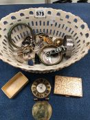 A FRENCH PORCELAIN BASKET OF DRESS JEWELLERY, LADYS WRISTWATCHES AND A CARTIER TRAVEL CLOCK