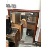 A LARGE PINE FRAMED WALL MIRROR