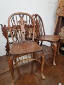 A SET OF FIVE WINDSOR SIDE CHAIRS WITH CABRIOLE FORE LEGS AND CRINOLINE STRETCHER