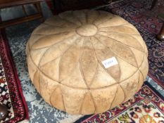 A LARGE MOROCCAN LEATHER POUF
