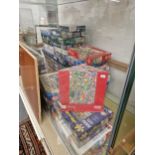 A LARGE COLLECTION OF JIGSAW PUZZLES.