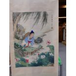 A CHINESE SCROLL PAINTED WITH A GIRL PAINTING LOTUS BELOW AND WILLOW TREE TO WHICH HER WATER BUFFALO