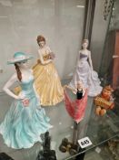 THREE WORCESTER FIGURES OF LADIES, ANOTHER ART DECO FIGURE AND A HUMMEL CONCERTINA PLAYER