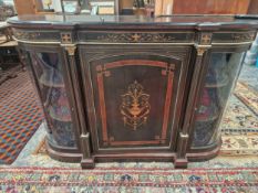 A VICTORIAN EBONISED AND INLAID GLAZED BOW SIDE CREDENZA