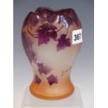 A LEGRAS CAMEO GLASS VASE OVERLAID WITH PURPLE VINE LEAVES AGAINST A FROSTED PINK TINGED GROUND. H