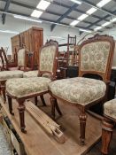 A SET OF 4 VICTORIAN CARVED OAK DINING CHAIRS.