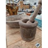 AN ANTIQUE TREEN PESTLE AND MORTAR, AND A HAND MADE BOWL.