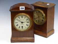 TWO EARLY 20th C. OAK CASED TIMEPIECES BY WINTERHALDER AND HOFMEIER