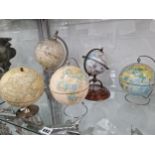 FIVE VARIOUS TERRESTIAL GLOBES, TO INCLUDE TWO ON MAGNETIC WIRE WORK STANDS