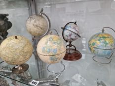 FIVE VARIOUS TERRESTIAL GLOBES, TO INCLUDE TWO ON MAGNETIC WIRE WORK STANDS