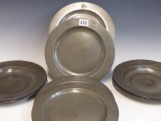 SIX 18th C. PEWTER PLATES, TO INCLUDE TWO WITH ELEPHANT CRESTS. Dia. 24cms.